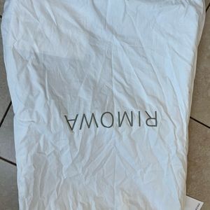 RIMOWA “ESSENTIAL NEON” SUITCASES